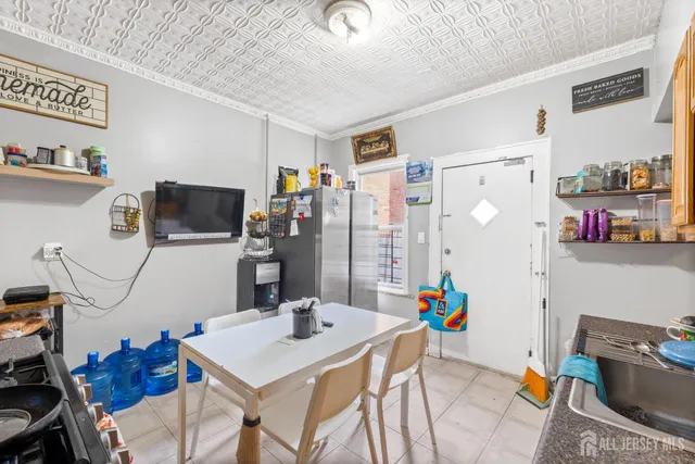 a view of a workspace with furniture