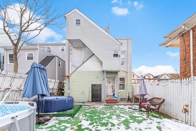 a front view of a house with patio