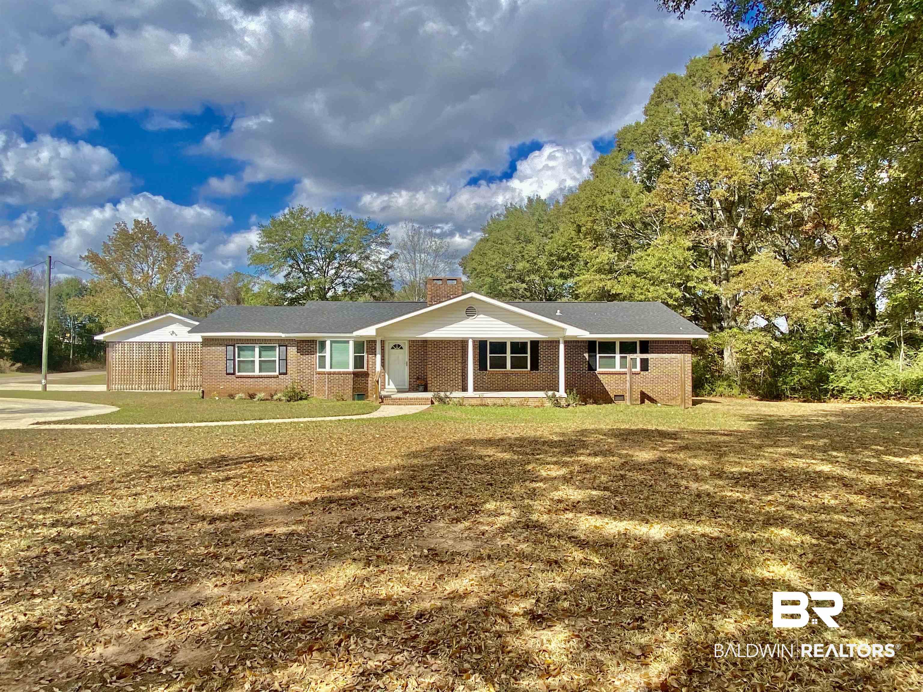 265 Azalea Drive Monroeville, AL 36460 - Photo 35 of 39 Single story home with a front yard