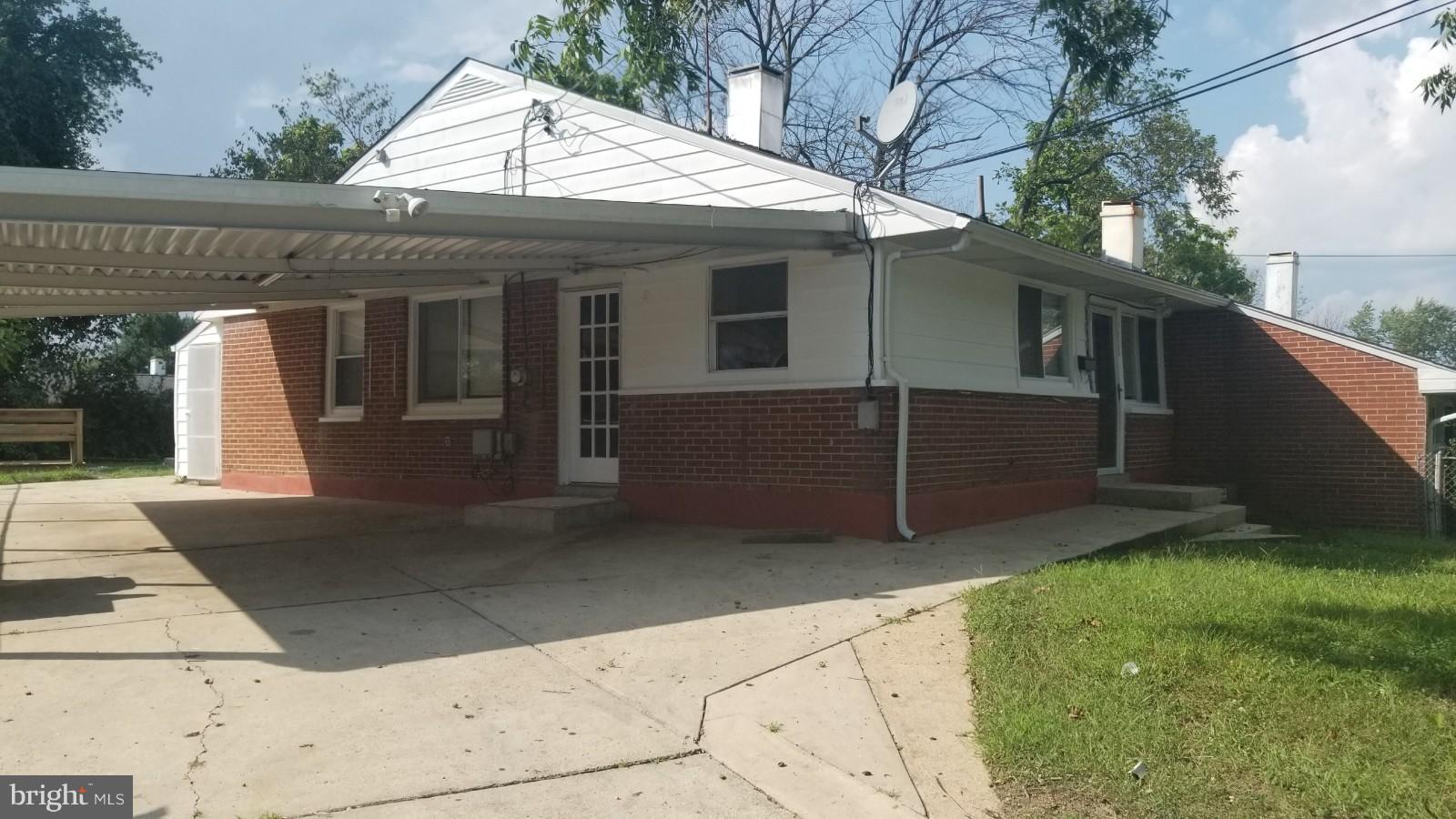 7828 Burnside Road Landover, MD 20785 - Photo 1 of 12 a view of a house with a yard