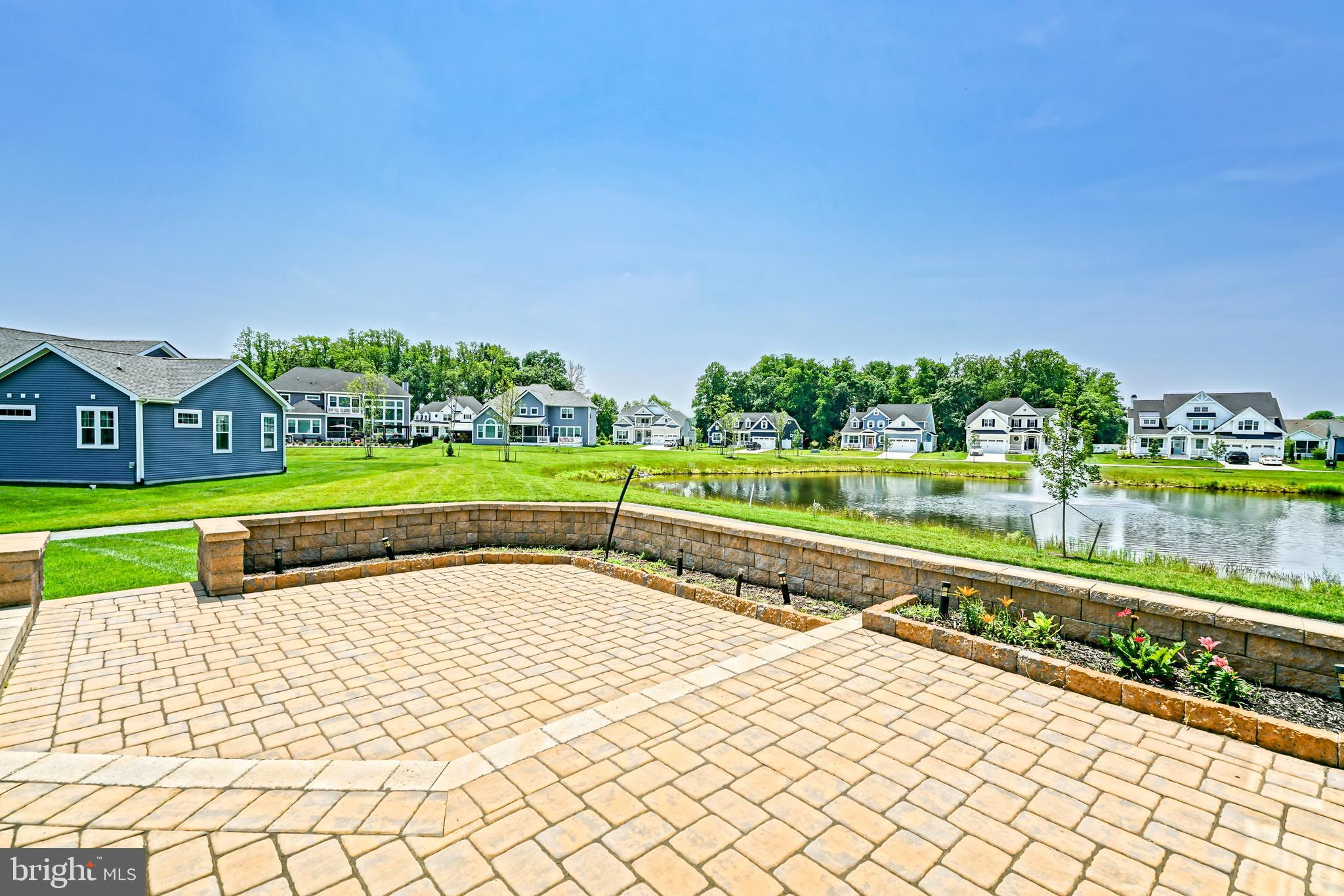 33557 Downing Circle Lewes, DE 19958 - Photo 68 of 89 a view of swimming pool with outdoor space and seating area