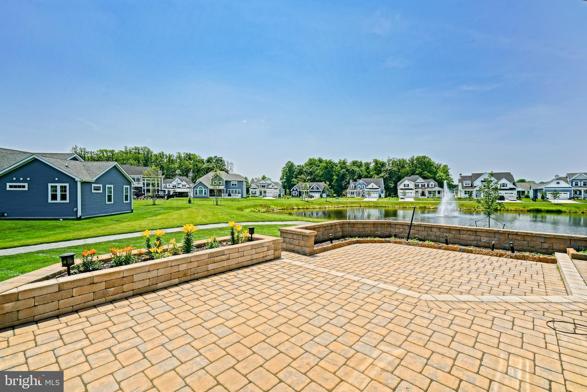 33557 Downing Circle Lewes, DE 19958 - Photo 70 of 89 a view of a swimming pool and a yard