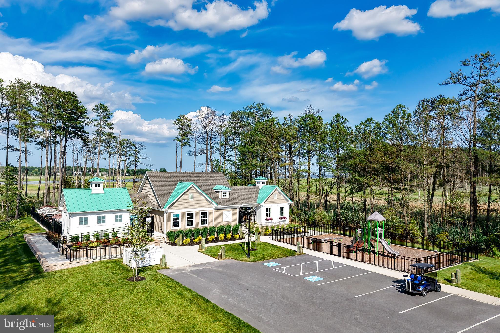 33557 Downing Circle Lewes, DE 19958 - Photo 79 of 89 a view of yard with swimming pool and outdoor seating