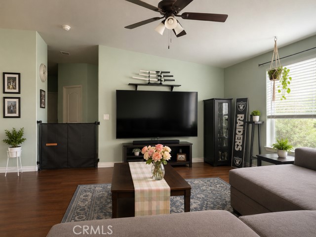 28820 Memory Winchester, CA 92596 - Photo 2 of 18 a living room with furniture and a flat screen tv