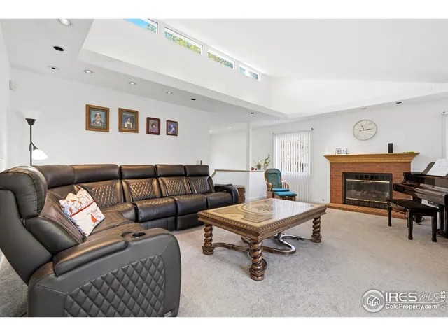 a kitchen with granite countertop a sink and cabinets