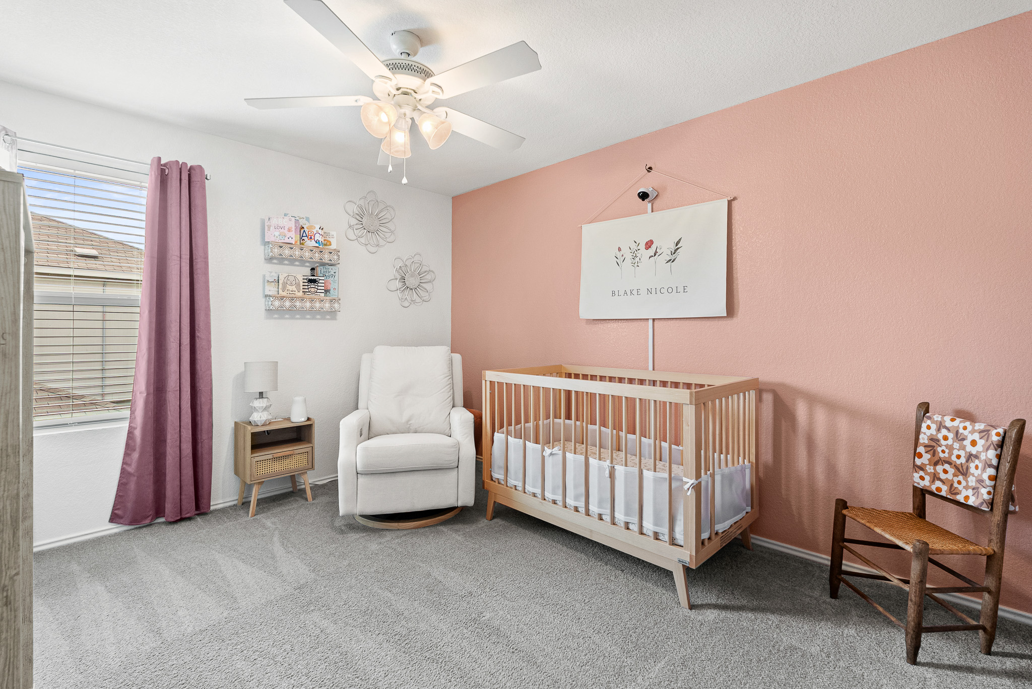 136 Copper Lane Kyle, TX 78640 - Photo 25 of 33 Carpeted bedroom with a nursery area and a ceiling fan