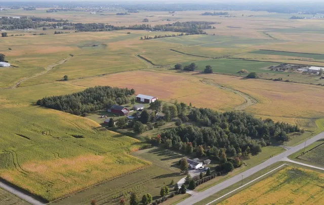 a bathroom with a mirror and a shower