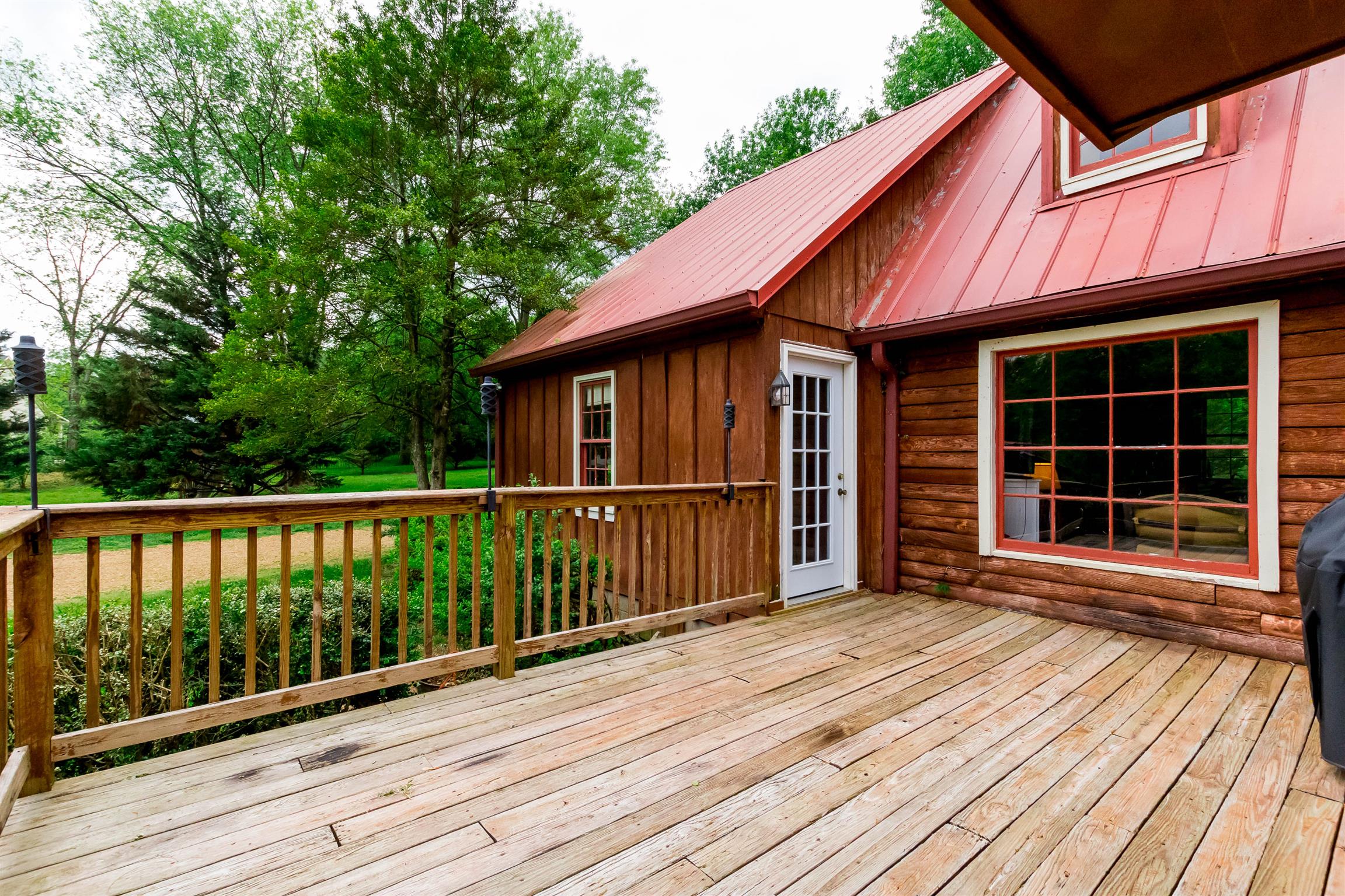 9723 Concord Road Brentwood, TN 37027 - Photo 11 of 30 a view of a house with wooden deck