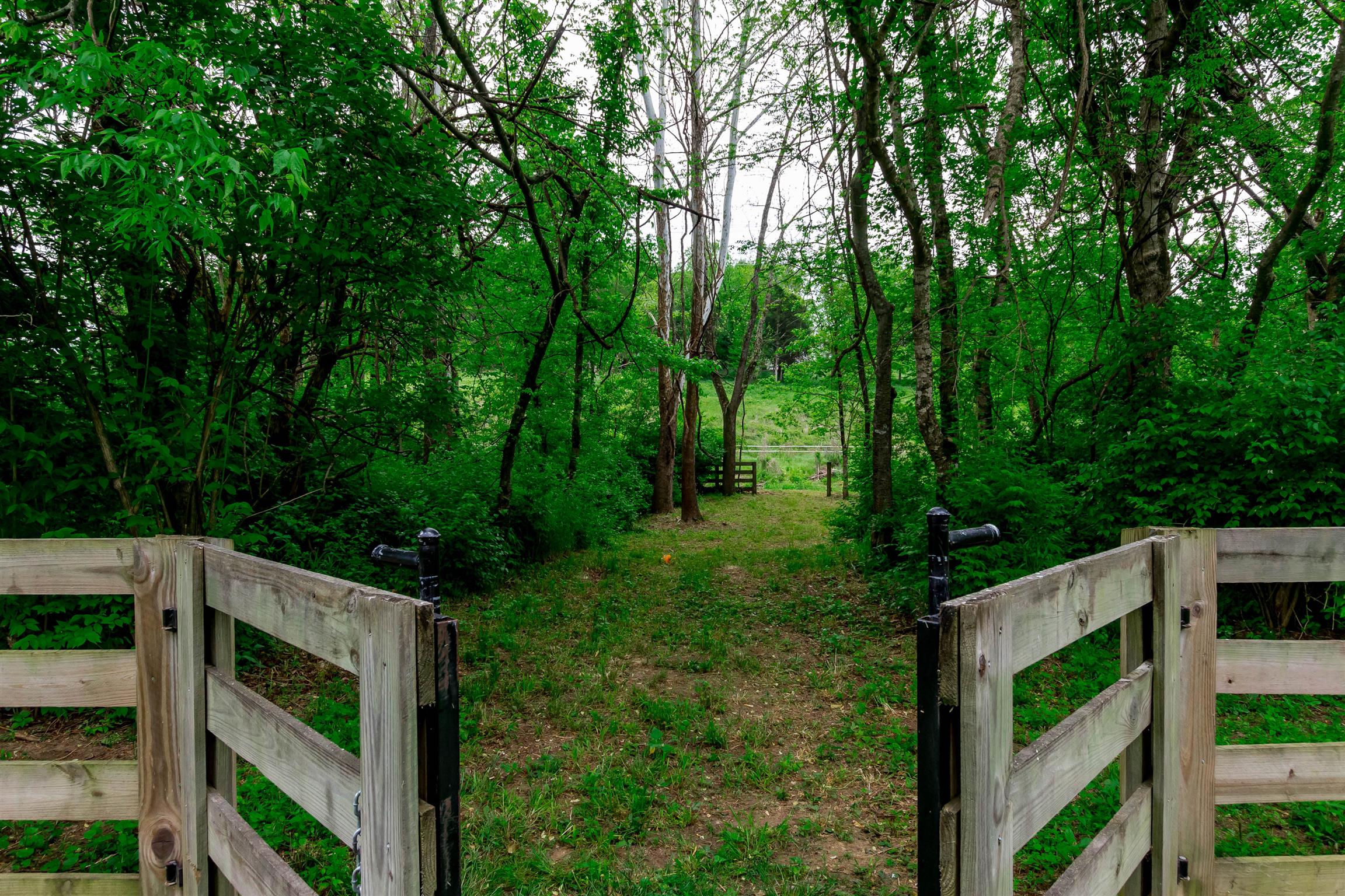 9723 Concord Road Brentwood, TN 37027 - Photo 15 of 30 a view of a wooden fence and trees