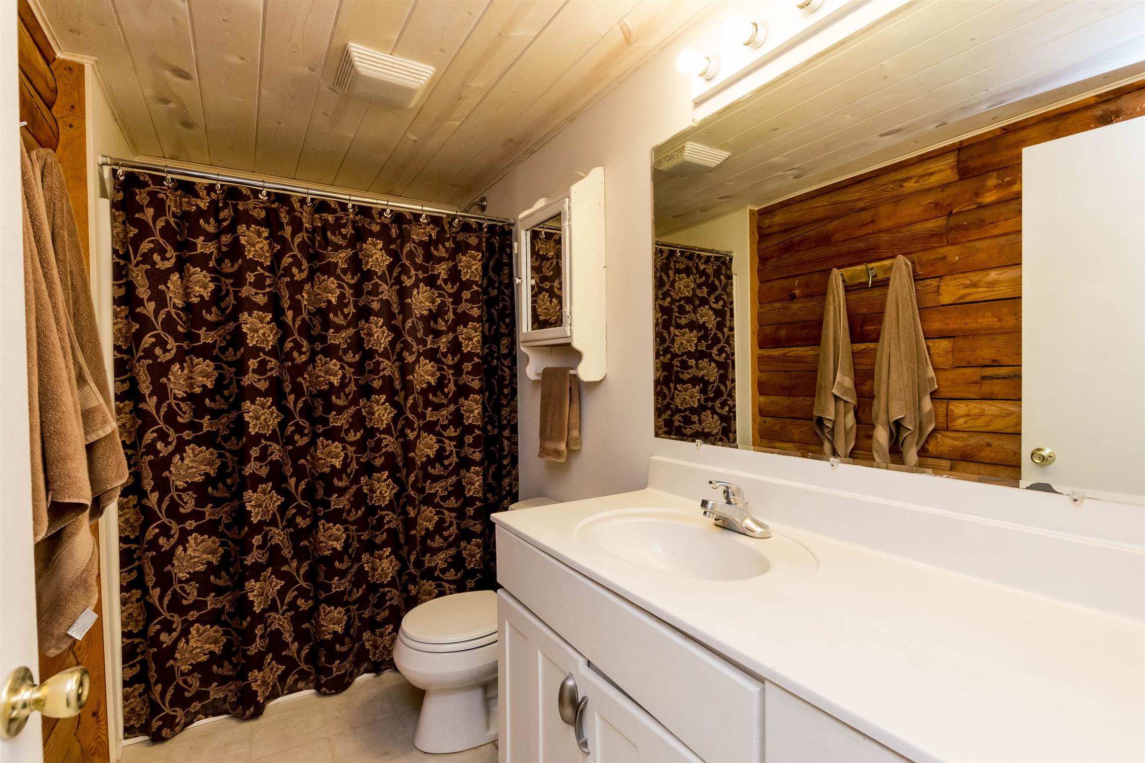 9723 Concord Road Brentwood, TN 37027 - Photo 18 of 30 a bathroom with a granite countertop sink and a toilet
