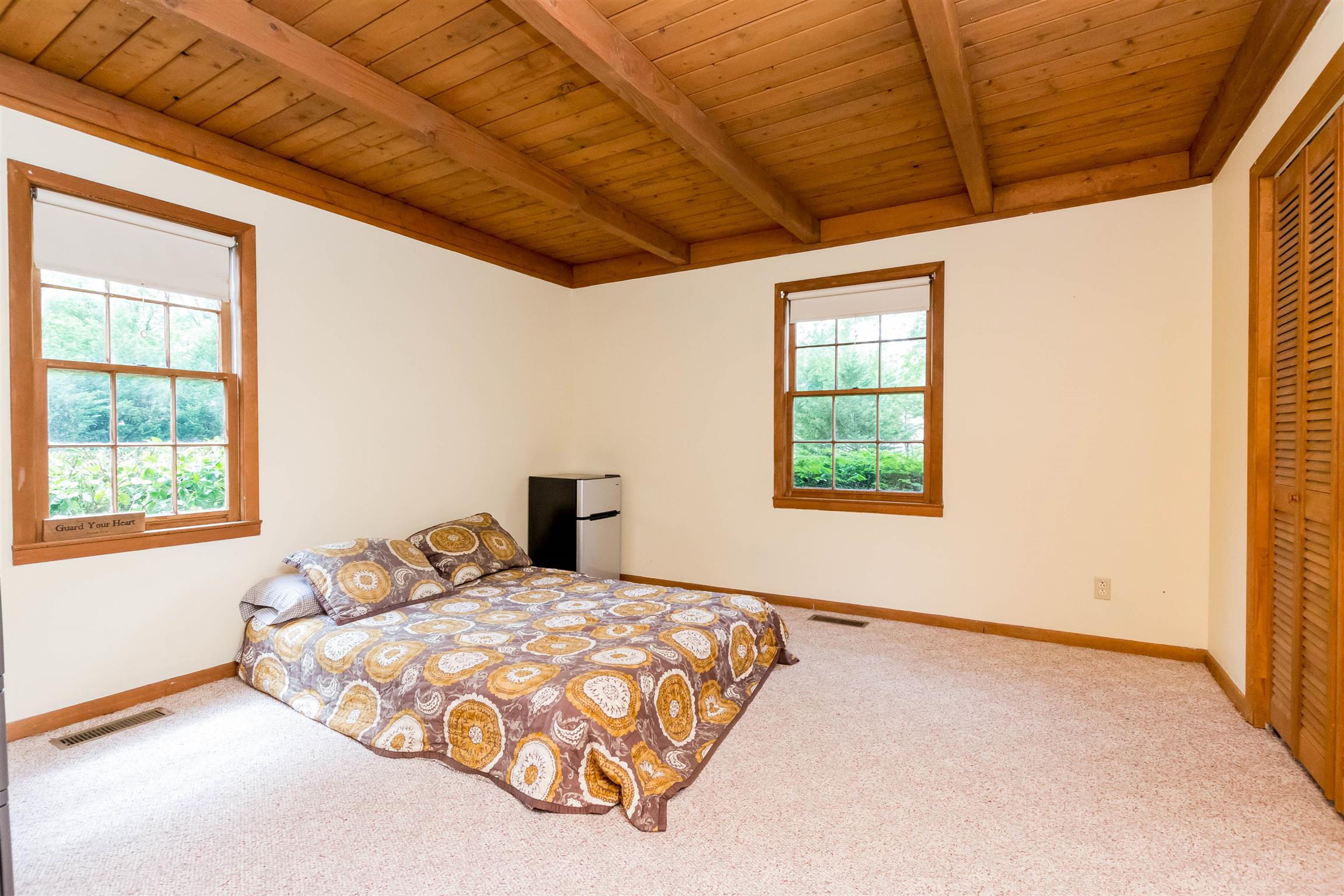 9723 Concord Road Brentwood, TN 37027 - Photo 21 of 30 a bedroom with a bed and a window
