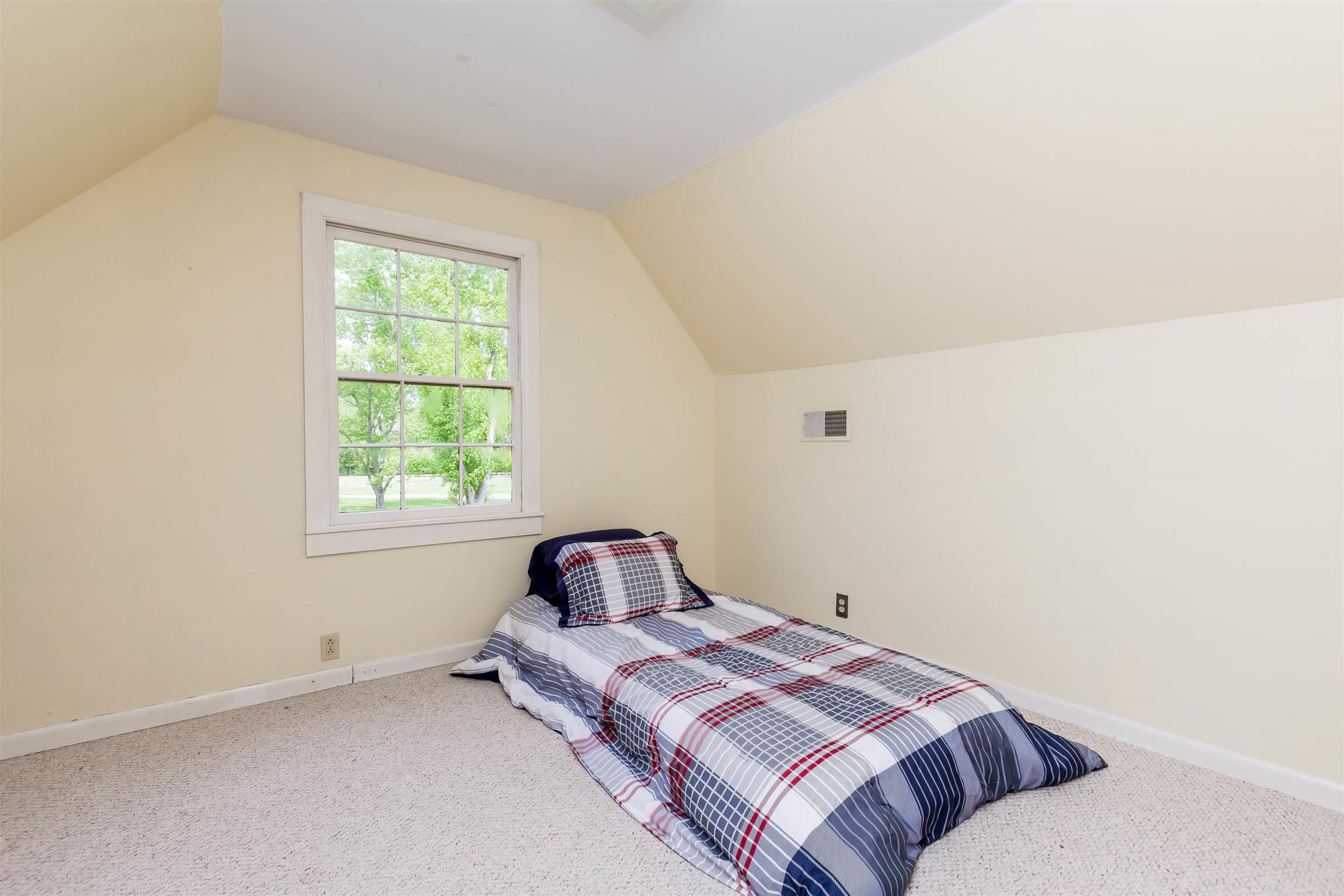 9723 Concord Road Brentwood, TN 37027 - Photo 29 of 30 a bedroom with a bed and a window