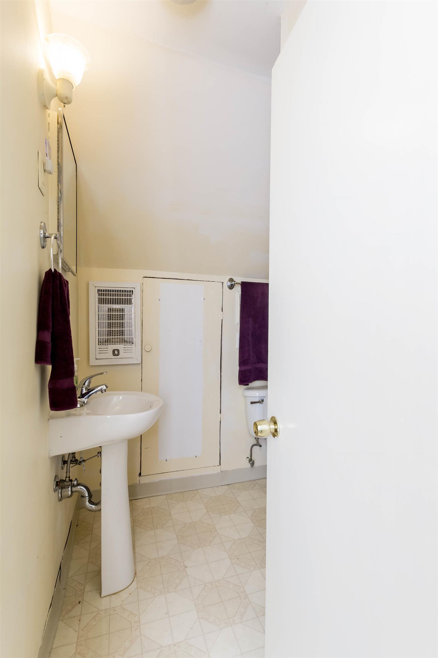 9723 Concord Road Brentwood, TN 37027 - Photo 30 of 30 a bathroom with a sink and a mirror