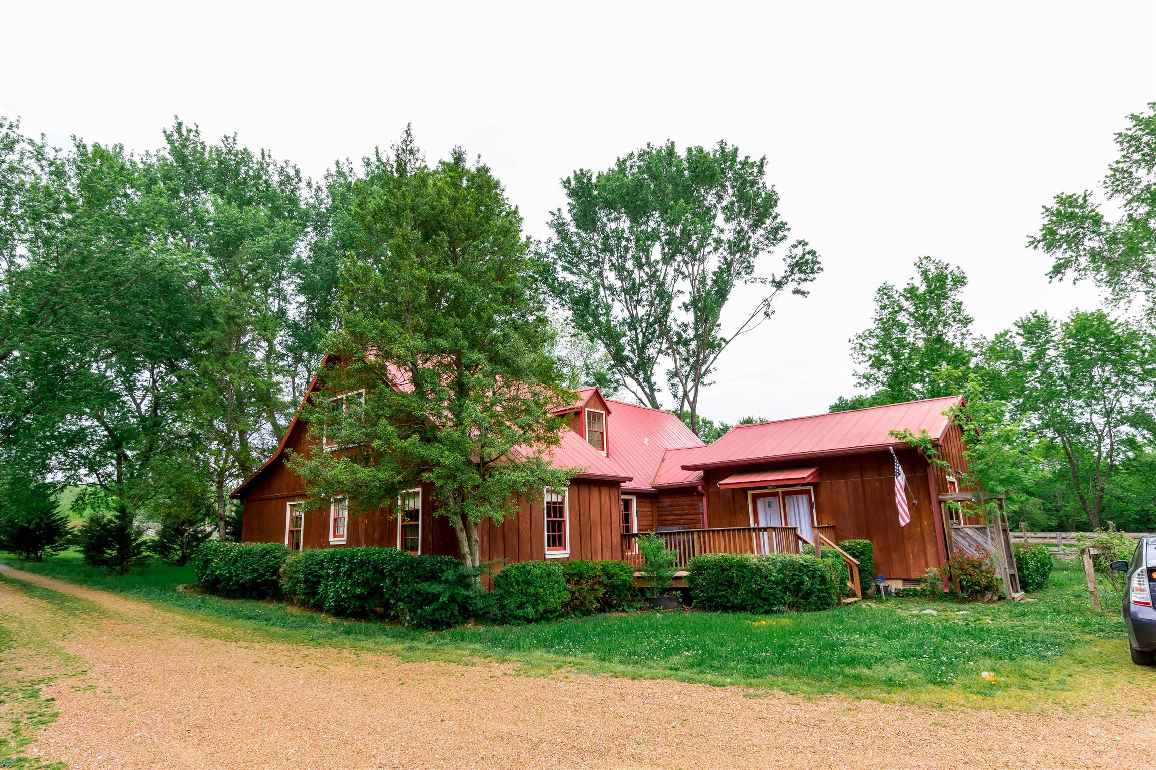 9723 Concord Road Brentwood, TN 37027 - Photo 5 of 30 a front view of a house with a garden