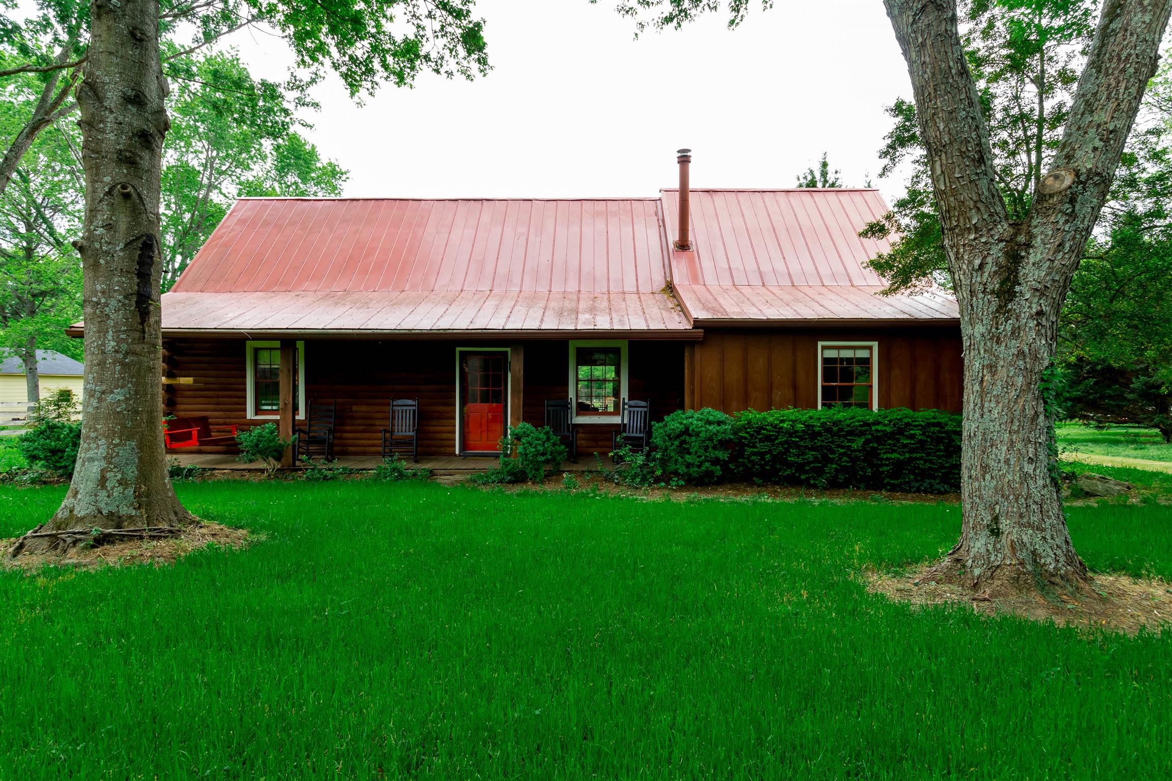 9723 Concord Road Brentwood, TN 37027 - Photo 10 of 30 a front view of a house with a garden