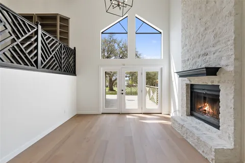a view of an entryway with wooden floor