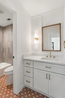 a bathroom with a sink and a bathtub