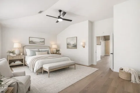 a view of an empty room with a fireplace