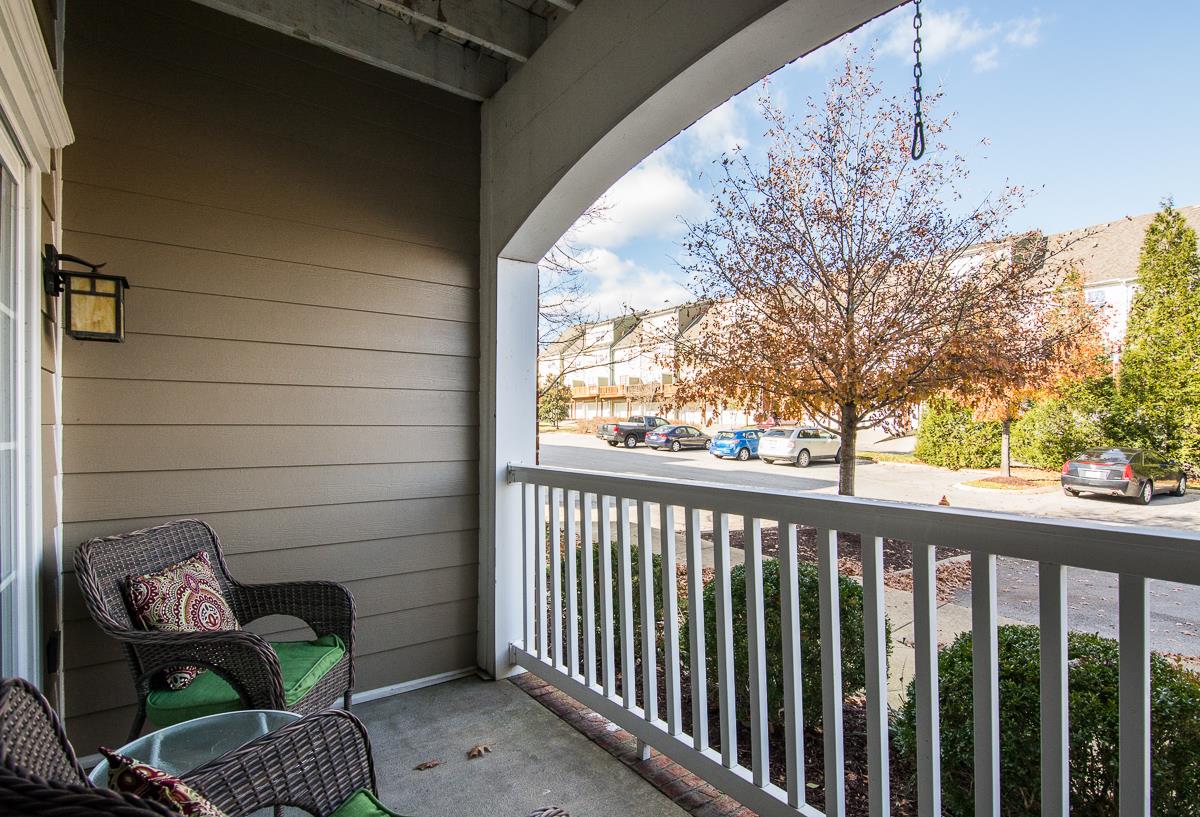 8401 Callabee Way, Unit 4 Nashville, TN 37211 - Photo 3 of 19 a view of a balcony with chair and table