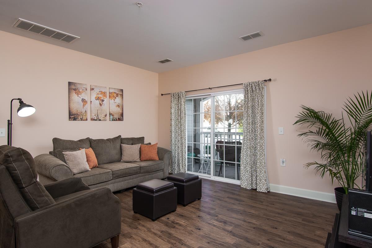 8401 Callabee Way, Unit 4 Nashville, TN 37211 - Photo 4 of 19 a living room with furniture and a large window