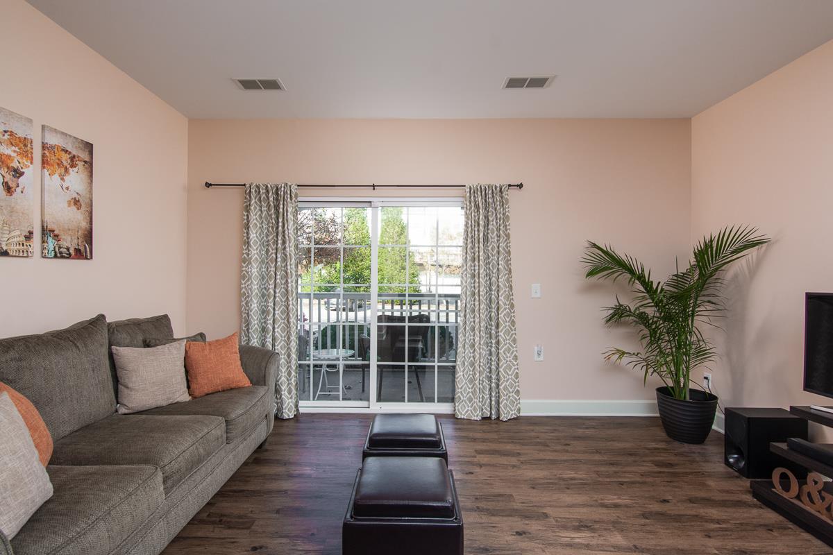 8401 Callabee Way, Unit 4 Nashville, TN 37211 - Photo 5 of 19 a living room with furniture and a large window