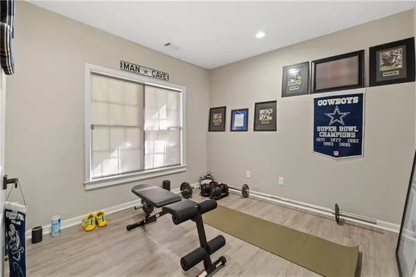 an aerial view of a residential apartment building with a yard