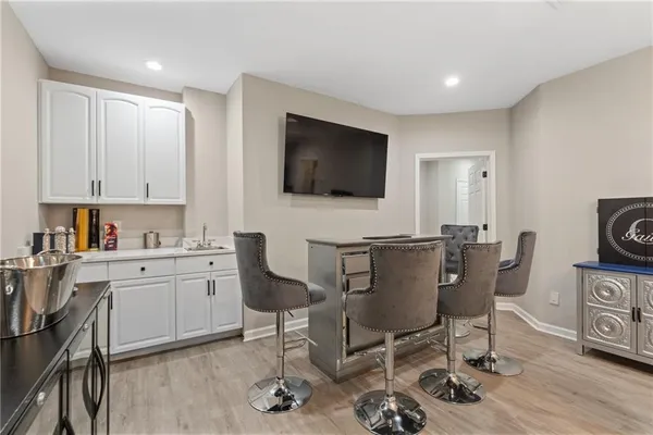 a view of a lake with a yard