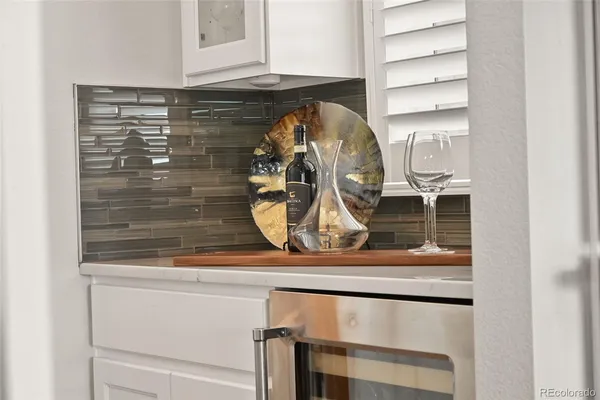 a closeup of a sink and a mirror