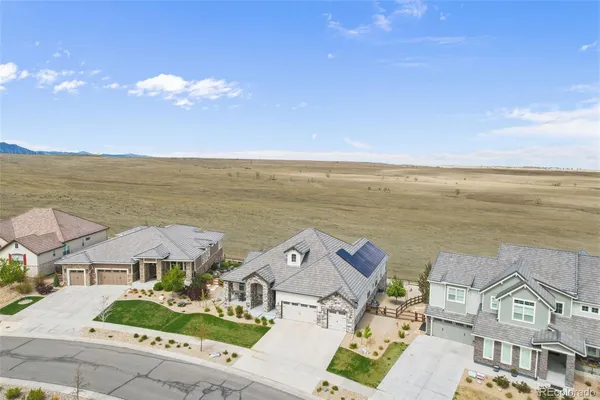 an aerial view of residential building with outdoor space