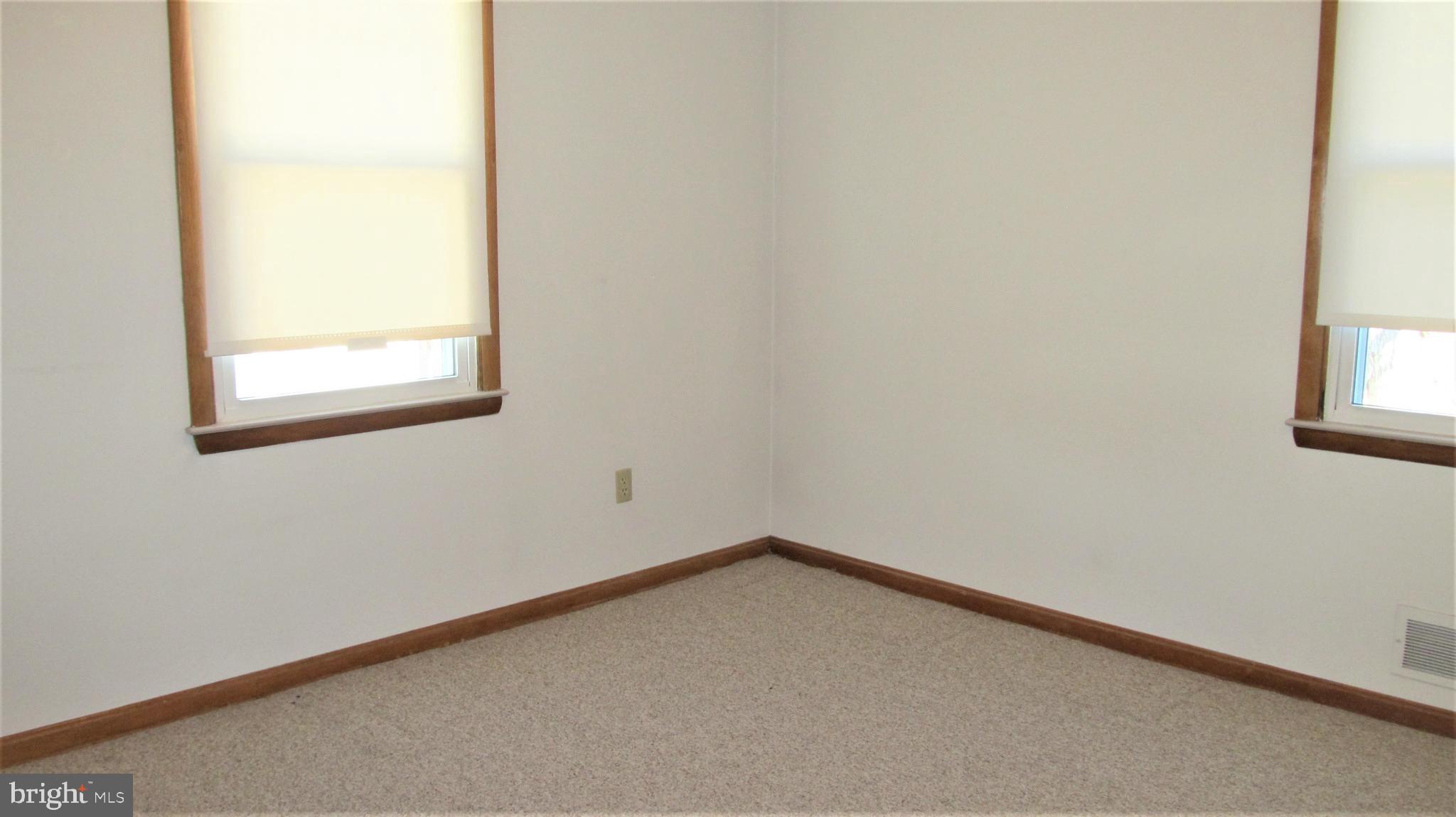 404 Charles Road Linthicum, MD 21090 - Photo 14 of 23 Downstairs bedroom
