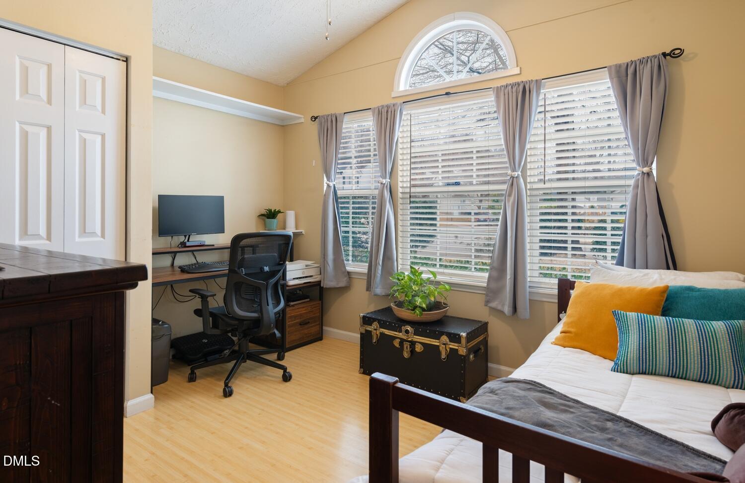 6900 Glenroy Court Raleigh, NC 27616 - Photo 17 of 30 a view of a workspace with furniture and a window