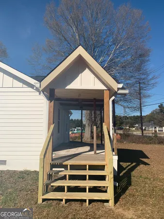 a view of a house with a porch