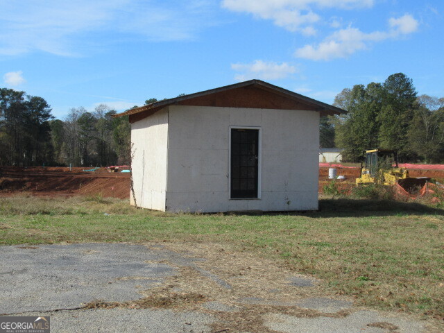4294 Austell Powder Springs Road Southwest Powder Springs, GA 30127 - Photo 32 of 35 storage building in back
