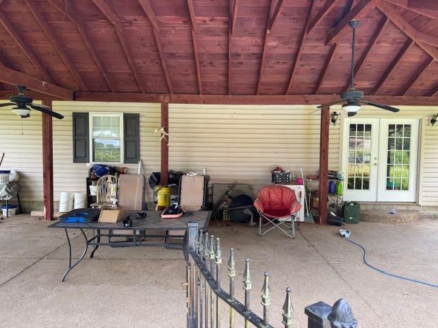 110 Falcon Cove Middleton, TN 38052 - Photo 15 of 20 a living room with furniture a flat screen tv and a large window