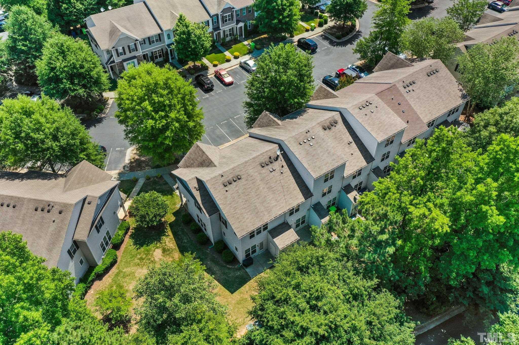 3012 Berkeley Springs Place Raleigh, NC 27616 - Photo 21 of 22 an aerial view of a house with a yard