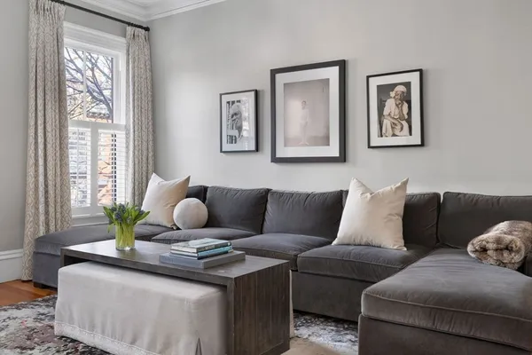 a living room with furniture and window