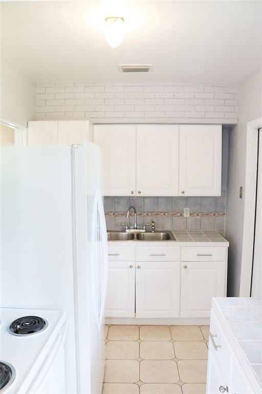 2640 Southwest 79th Avenue Miami, FL 33155 - Photo 13 of 23 a bathroom with a sink a vanity and a mirror
