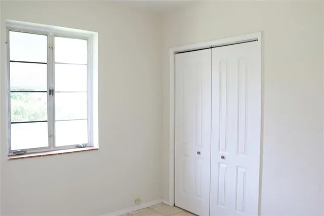 an empty room with a window