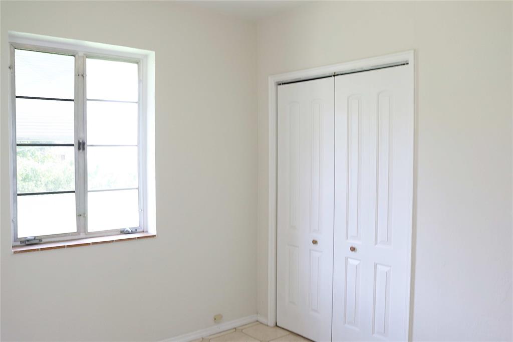 2640 Southwest 79th Avenue Miami, FL 33155 - Photo 18 of 23 a view of an empty room with a window
