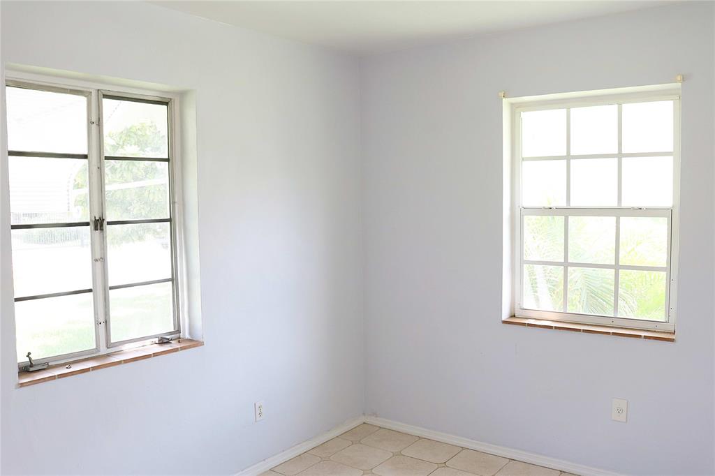 2640 Southwest 79th Avenue Miami, FL 33155 - Photo 20 of 23 an empty room with a window