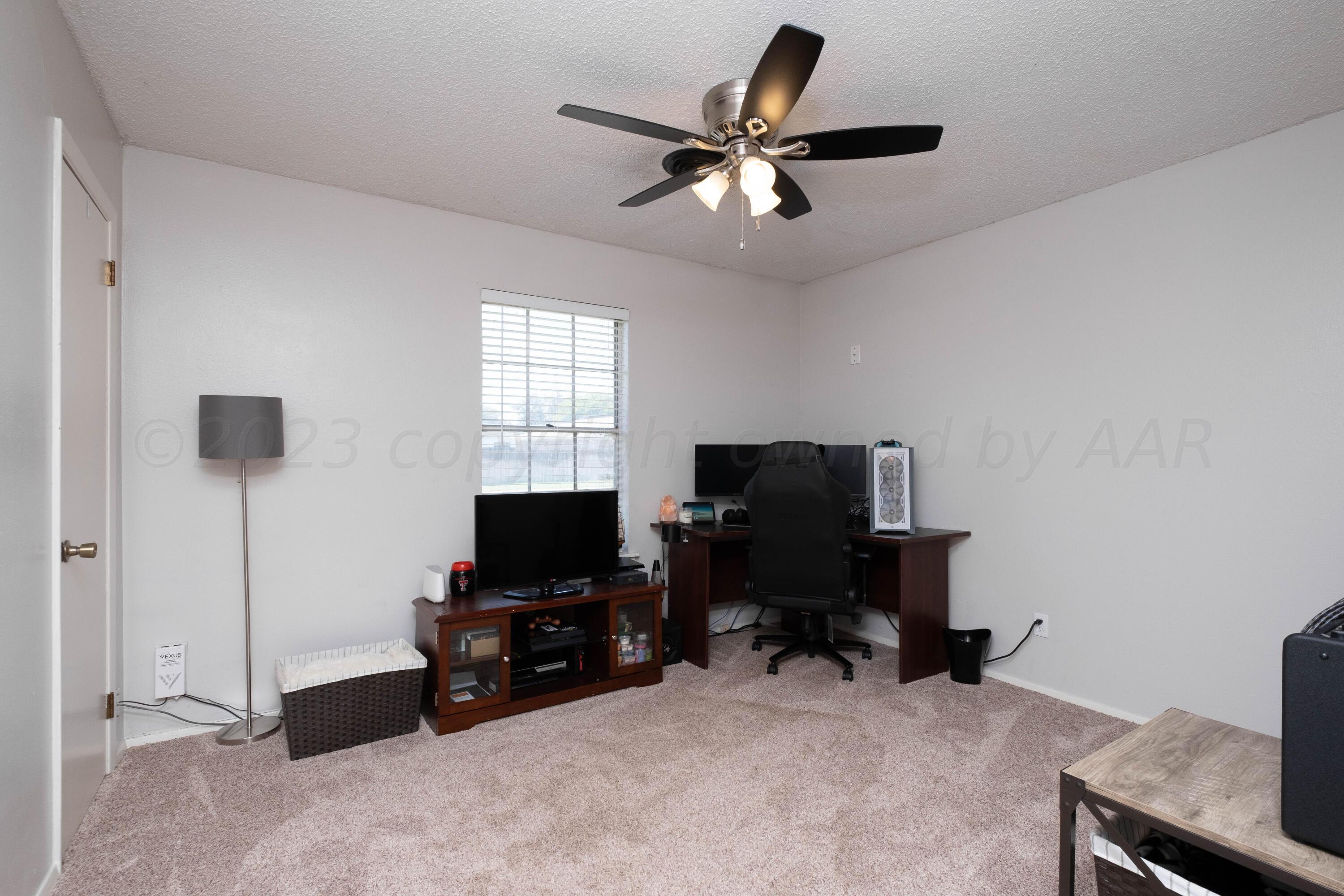 4813 South Rusk Street Amarillo, TX 79110 - Photo 20 of 23 a view of workspace with windows