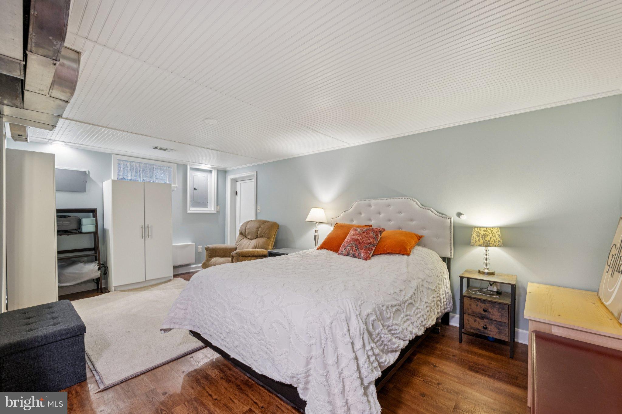 2307 Cheverly Avenue Cheverly, MD 20785 - Photo 12 of 25 a bedroom with a bed and a view of kitchen