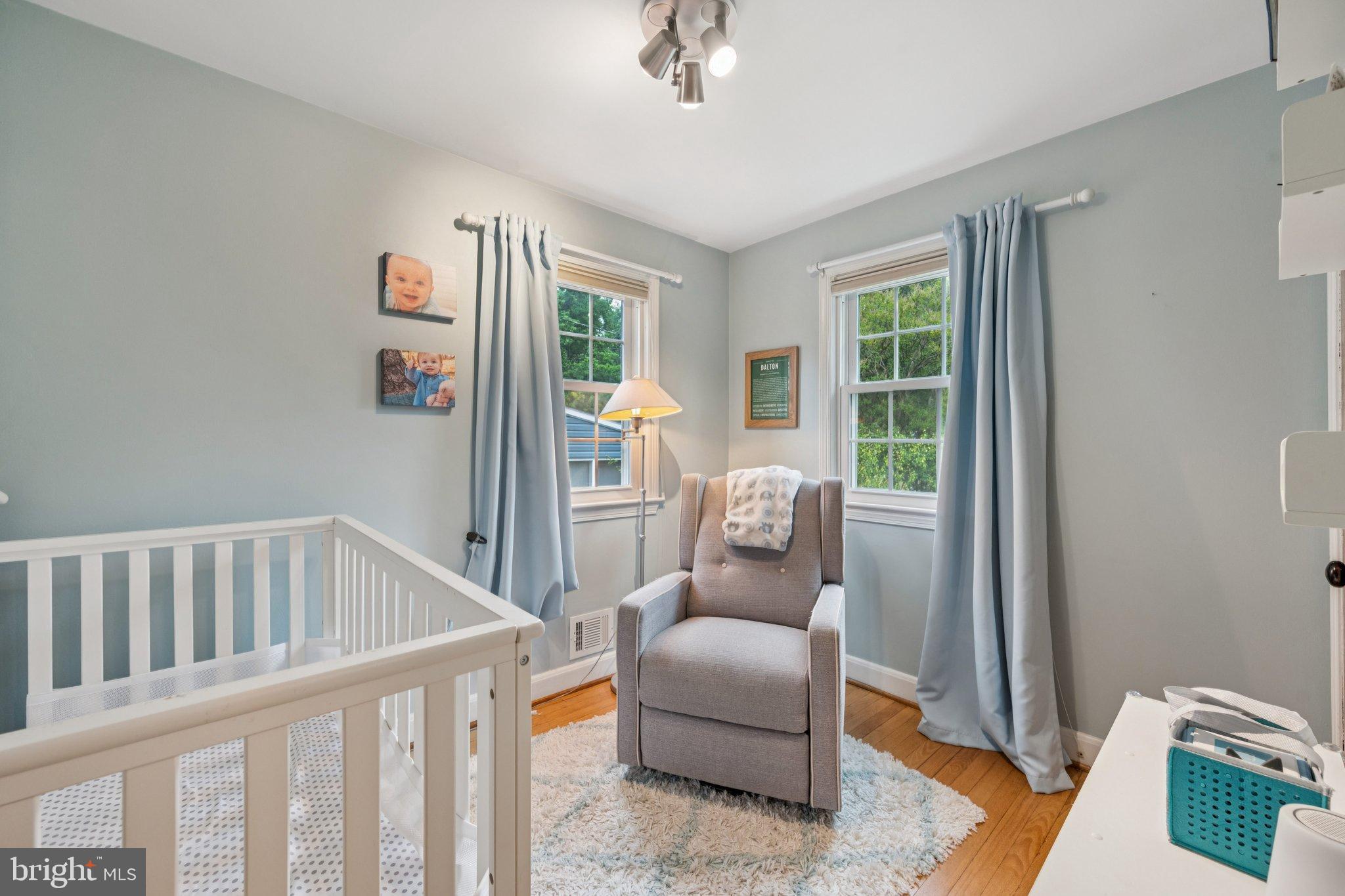 2307 Cheverly Avenue Cheverly, MD 20785 - Photo 15 of 25 a bedroom with furniture and a window