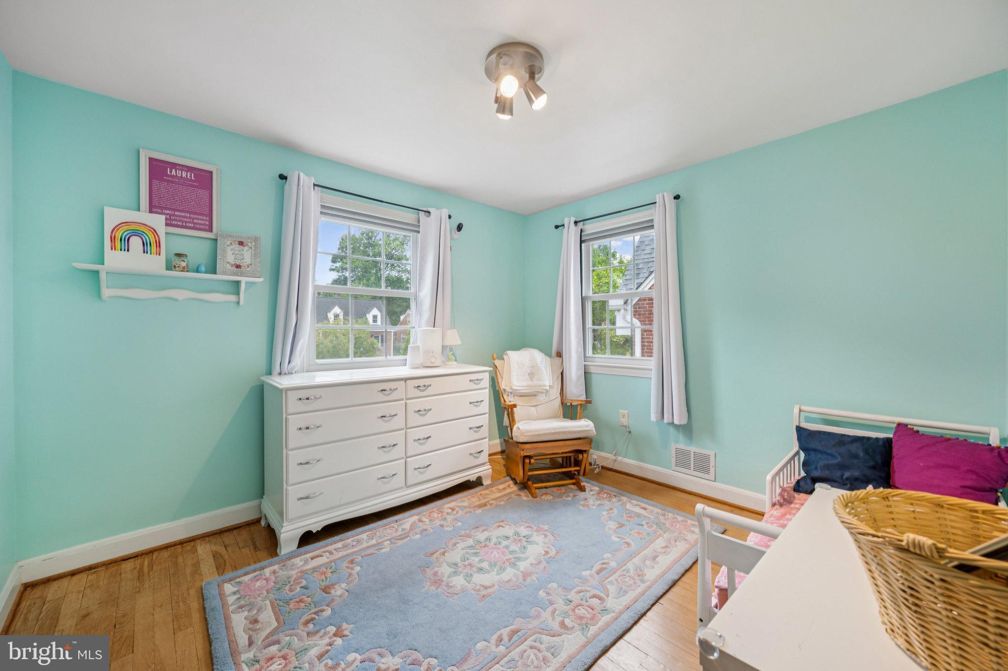 2307 Cheverly Avenue Cheverly, MD 20785 - Photo 18 of 25 a bed room with a bed and a window