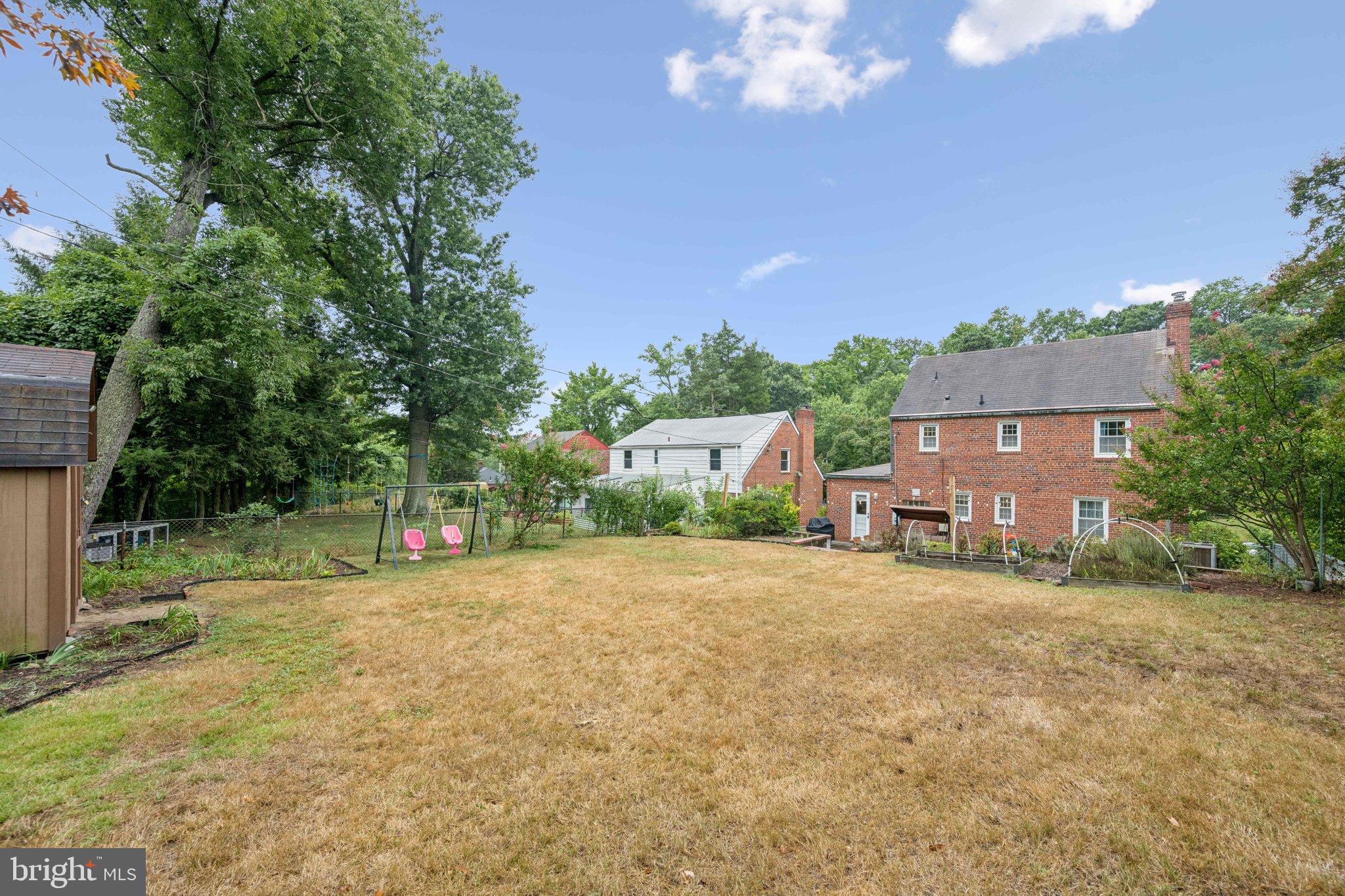 2307 Cheverly Avenue Cheverly, MD 20785 - Photo 25 of 25 a view of a house with a yard and a garage