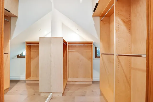 a view of a bathroom from a hallway