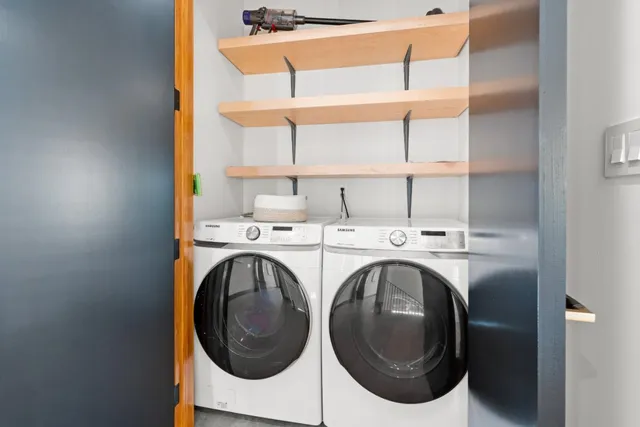 a view of a swimming pool and lounge chair