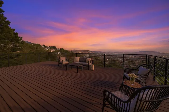 a view of a yard with table and chairs