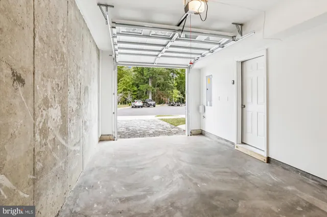 a view of a porch with wooden floor and windows