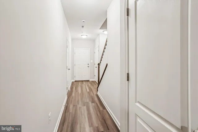 a view of entryway with wooden floor